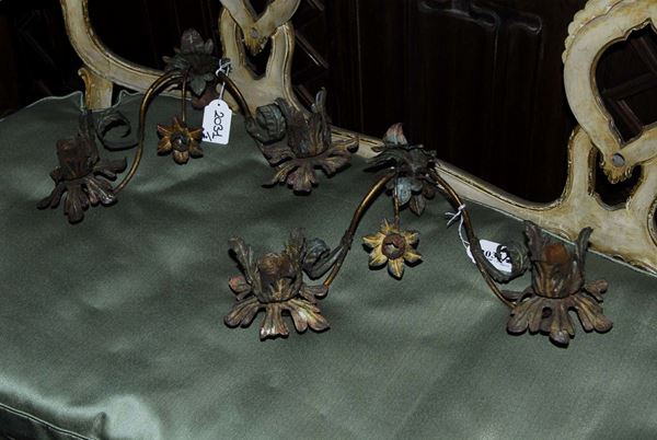 Due appliques in ferro battuto dipinto, fine XVII secolo