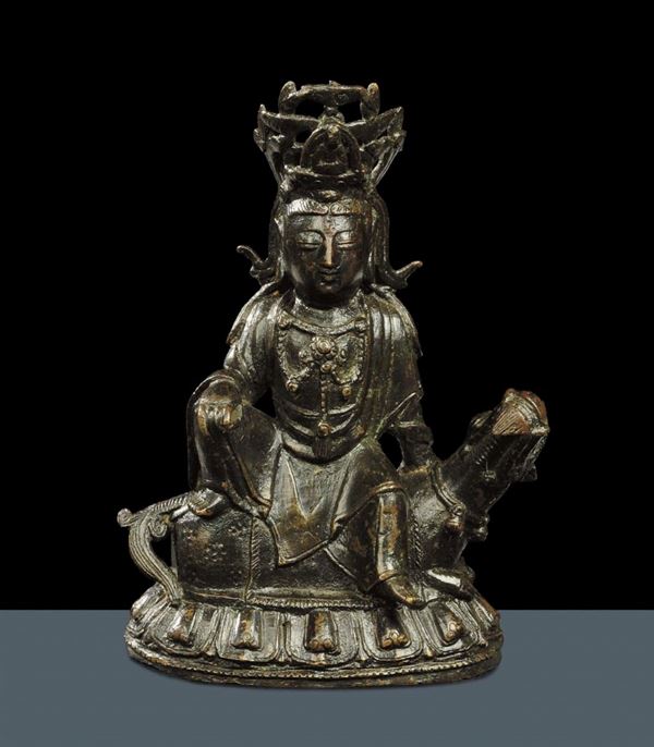 Figura di Bodhisattva in bronzo a patina scura