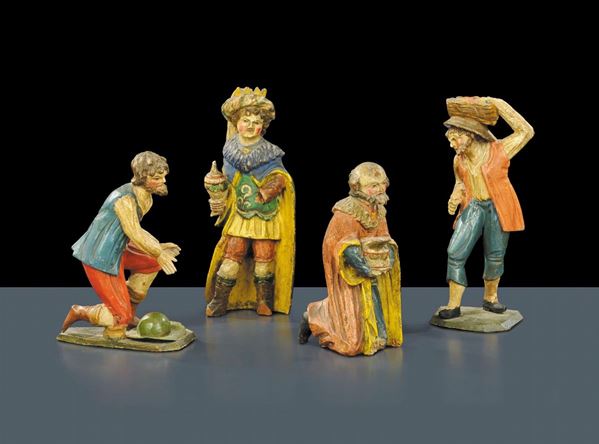 Quattro piccole sculture in legno intagliato e laccato in policromia, Venezia XIX secolo
