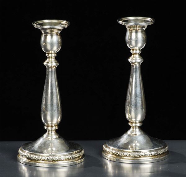 Coppia di candelieri in argento sterling