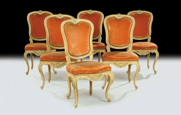 Tavolo e sei sedie in legno intagliato e laccato, XIX secolo
