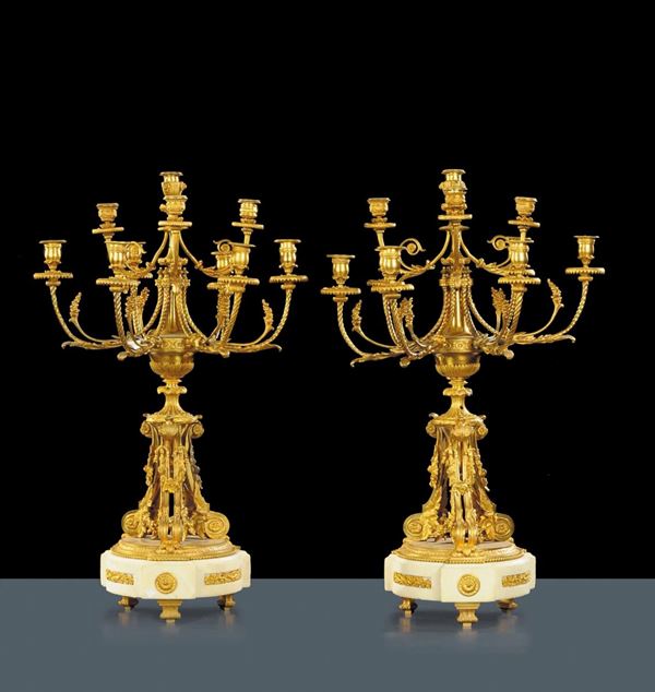 Coppia di candelieri in bronzo dorato, Francia XIX secolo