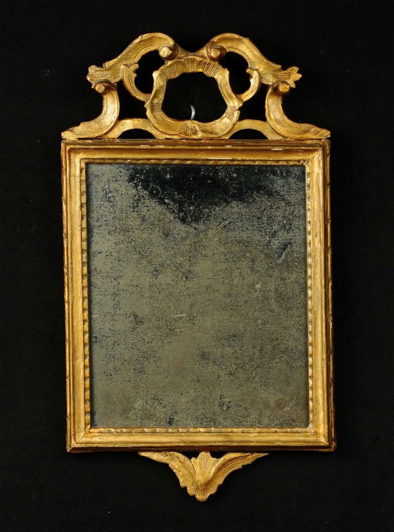Specchiera in legno intagliato e dorato, XIX secolo  - Asta Antiquariato, Argenti e Dipinti Antichi - Cambi Casa d'Aste