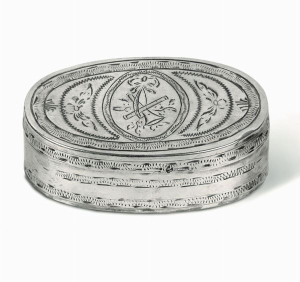An oval snuff box in embossed and chiselled silver with floral and musical motives, France 18th century
