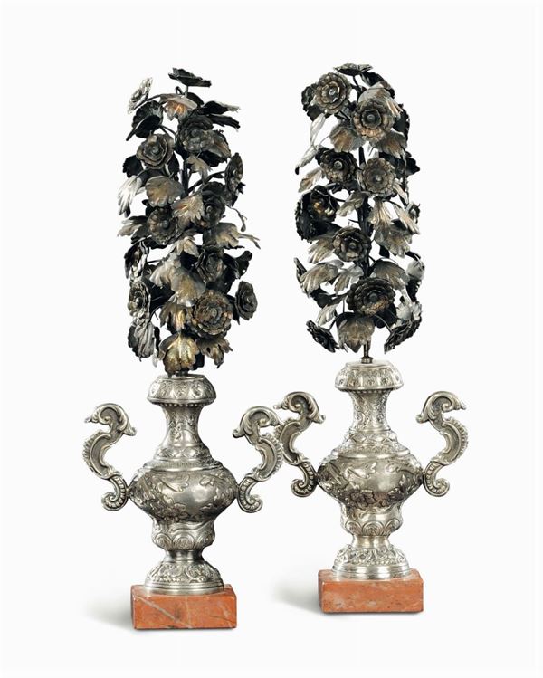 A pair of portapalme vases in embossed and chiselled silver, Southern Italy 19th century