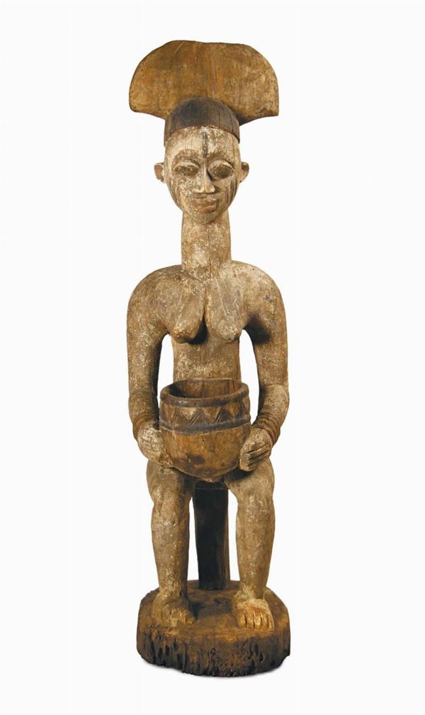 Figura da altare con coppa, Yoruba (Nigeria)