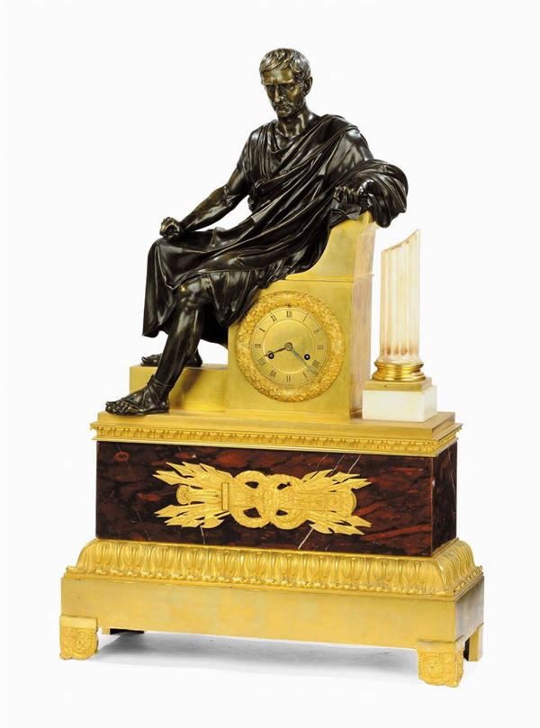 Orologio in bronzo dorato con figura sedente ispirata al Bruto dei Musei Capitolini di Roma, Francia 1815 circa
