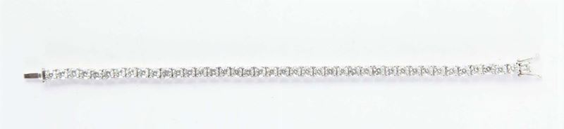 Braccialetto tipo tennis con diamanti per ct12,5 circa  - Asta Orologi e Gioielli Antichi e Contemporanei - Cambi Casa d'Aste