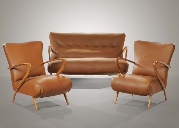 Salotto composto da un divano e due poltrone. Struttura in legno e rivestimenti in skai. Prod. Italia, 1950 ca.