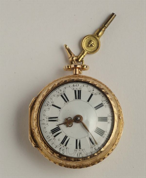 Orologio da tasca con cassa in oro lavorazione a sbalzo con numeri romani