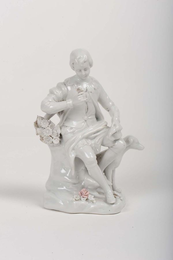 Statuina in ceramica bianca raffigurante fanciullo con cagnolino, Capodimonte XIX secolo