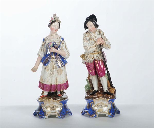 Coppia di statuine in porcellana, XIX secolo