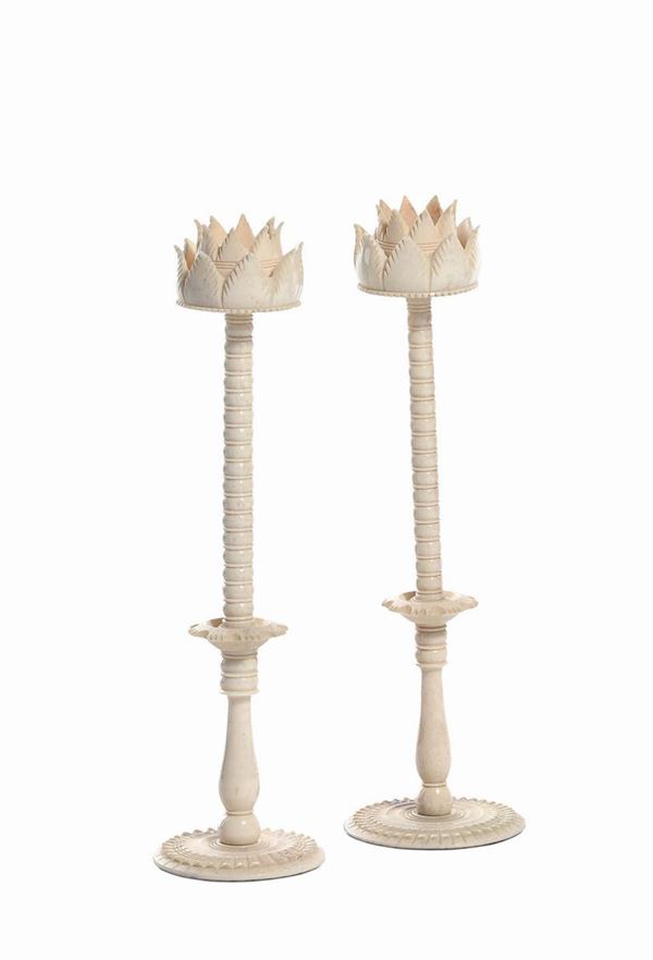 A pair of polished and carved ivory candlesticks, probably Indo-European colonial art, 18th-19th century