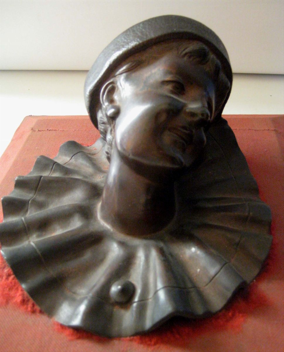 Coppia di Testine in Bronzo