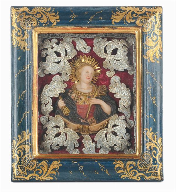 A polychrome wax composition representing Sant’Orsola within a lacquered and gilt wood frame, southern Germany 18th century