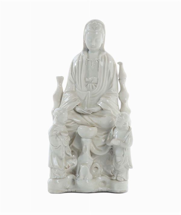 Group in Blanc de Chine Dehua porcelain with Guanyin and two children, China, Qing Dynasty, end 17th century