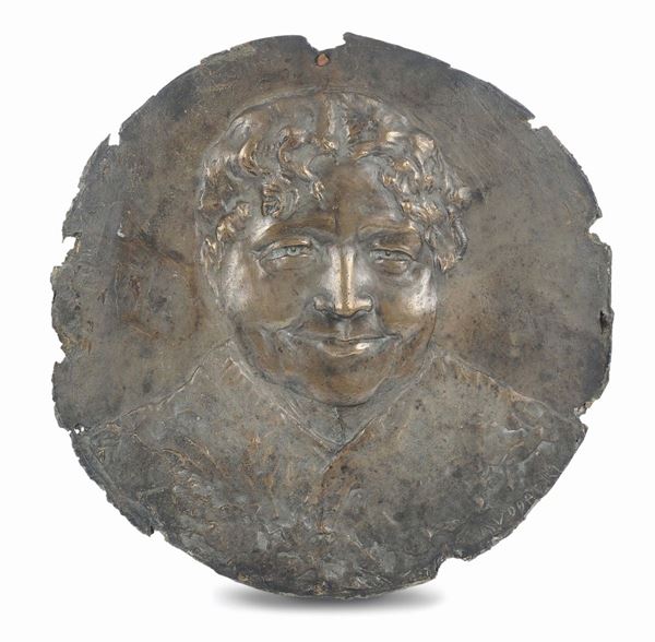 Tondo in bronzo raffigurante volto femminile