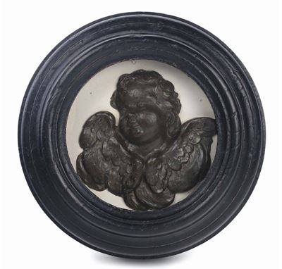 Altorilievo in Cera Monocroma Marrone Raffigurante Cherubino Entro Cornice in Legno Ebanizzato, I...