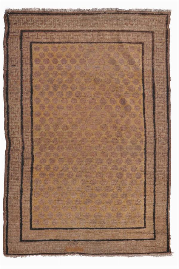 Hotan rug late 19th century.Overall good condition.