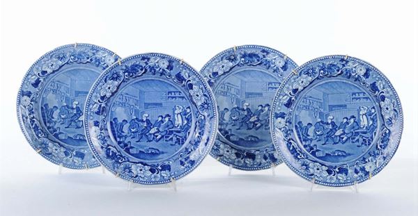 Lotto di quattro piatti in ceramica decoro bianco e blu