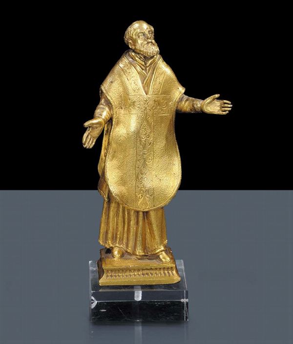 Figura in bronzo dorato raffigurante Sant’Ignazio di Lojola in atteggiamento estatico, Italia XVII secolo