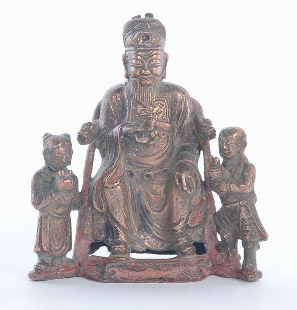 Piccolo bronzo con tre figure