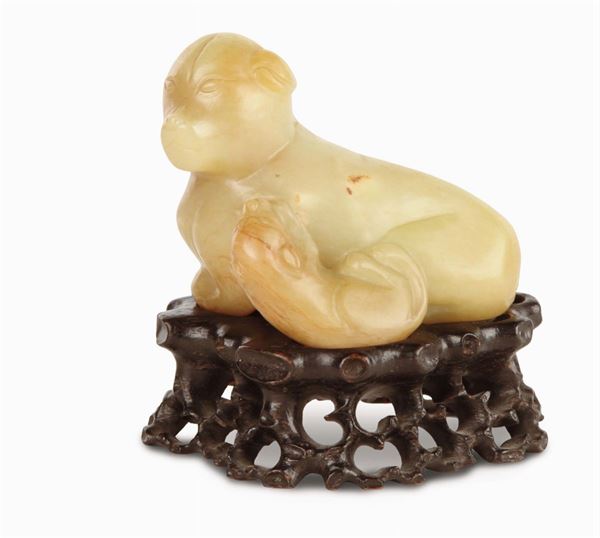 Yellow jade group representing a dog with a puppy, China, Qing Dynasty, 18th century