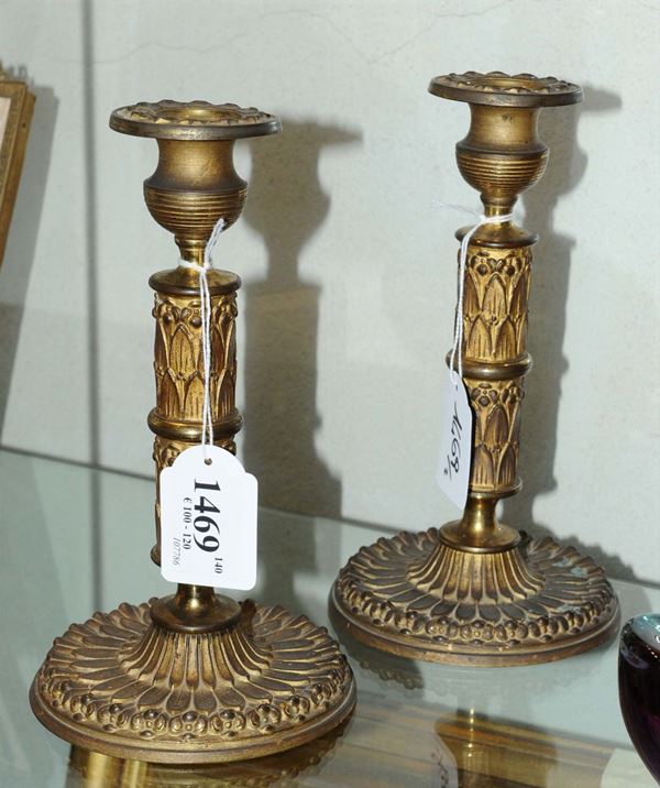 Coppia di candelieri in bronzo dorato