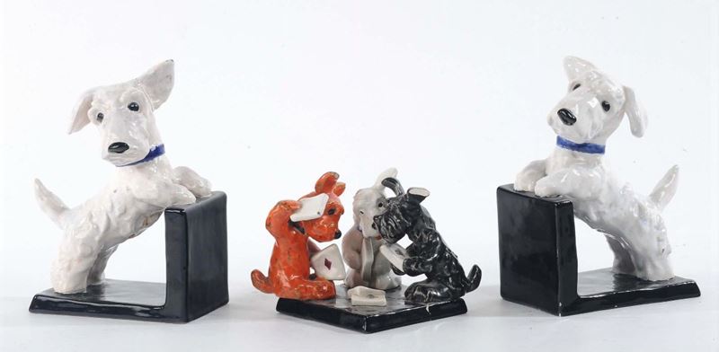 Coppia di fermalibri in ceramica con cani  - Auction OnLine Auction 4-2013 - Cambi Casa d'Aste