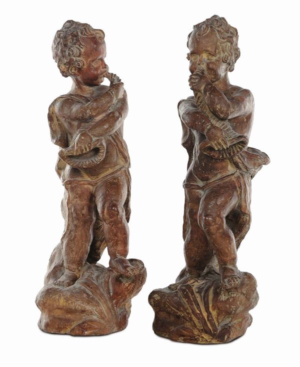 Coppia di putti musicanti in terracotta, XIX secolo