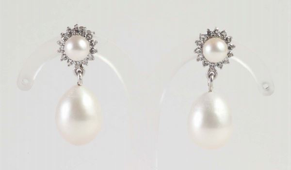 Orecchini con perle bianche