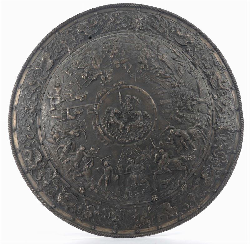Scudo decorativo in bronzo decorato con scene di battaglia  - Auction Antique and Old Masters - Cambi Casa d'Aste