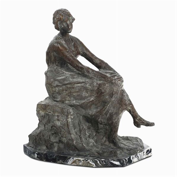 E. Pellini Figura femminile seduta