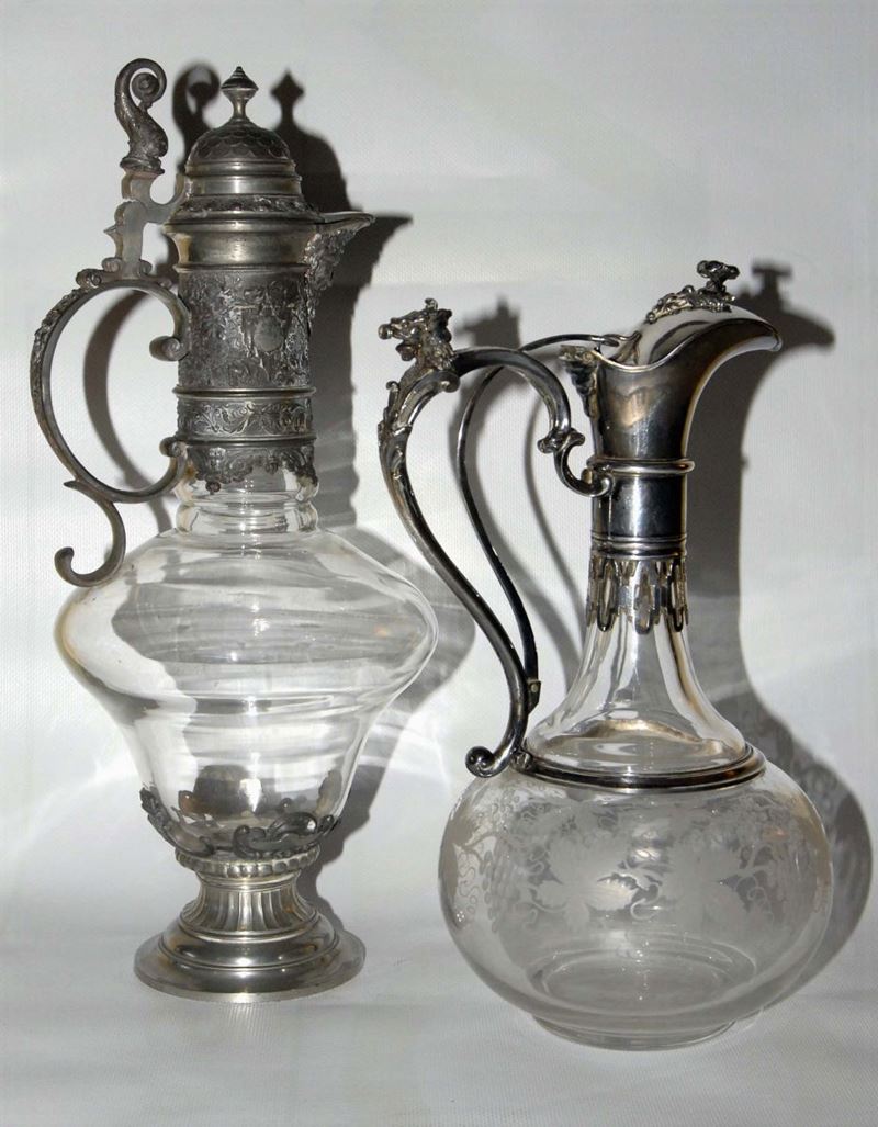 Due bottiglie di cui una con beccuccio in argento e una con beccuccio in metallo  - Auction Silvers, Ancient and Comtemporary Jewels - Cambi Casa d'Aste