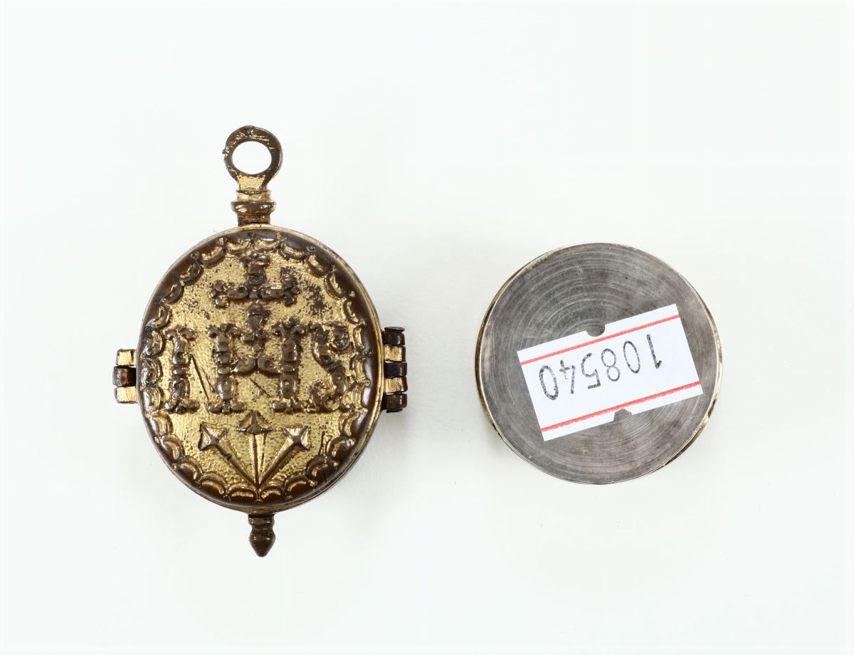 Lotto Comprendente Pendente Reliquiario Ovale in Rame Sbalzato, Fuso e Dorato con Monogrammi “ Mr...