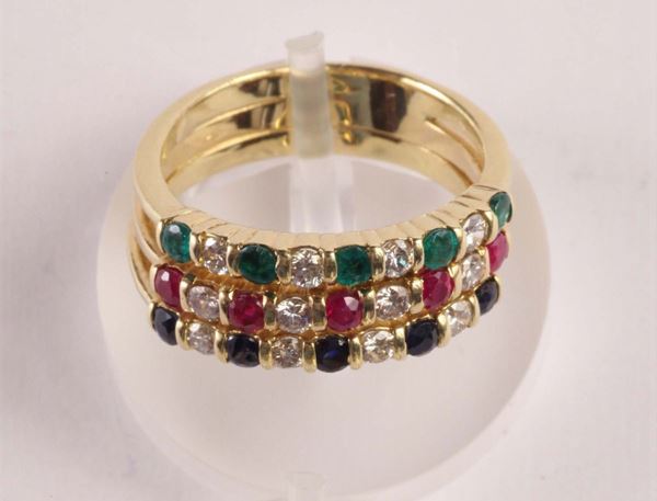 Anello con diamanti, zaffiri, rubini e smeraldi