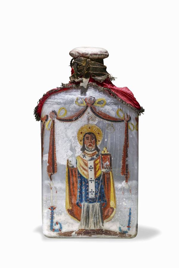 Bottiglia per la manna in vetro soffiato incolore a sezione rettangolare con tappo. Italia XVIII secolo