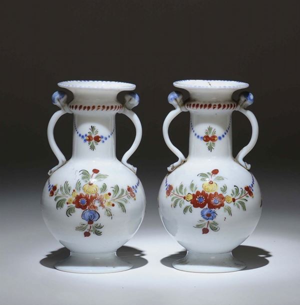 A pair of small lattimo glass two-handled vases with globular body. Germany, late 18th century