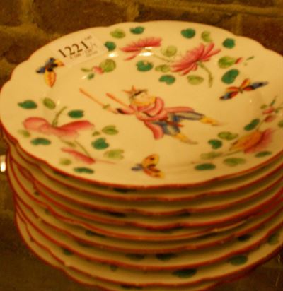 Nove Piatti in Porcellana con Decoro di Personaggi, Fiori e Farfalle, Inizio XX Secolo