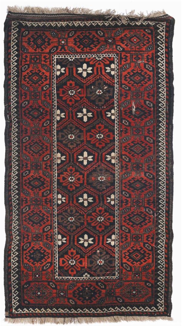 A Baluch rug end 19th early 20th century.