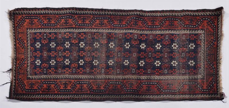 A Baluch rug early 20th century. Localised wear and holes.  - Auction Ancient Carpets - Cambi Casa d'Aste