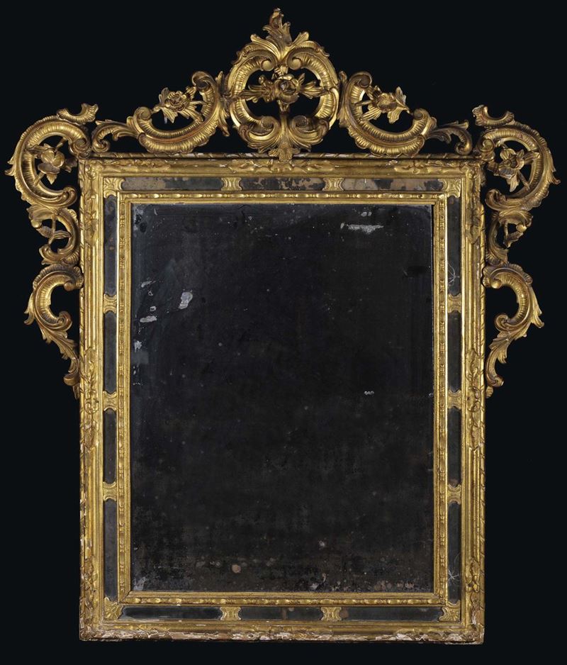 Specchiera Luigi XIV in legno intagliato e dorato  - Asta Antiquariato e Dipinti Antichi - Cambi Casa d'Aste