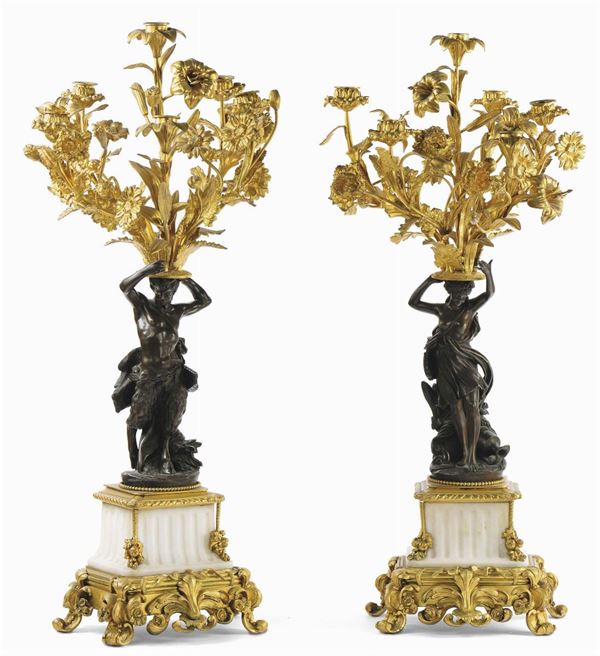 Coppia di flambeaux a sei luci in marmo bianco e bronzo dorato, XIX secolo