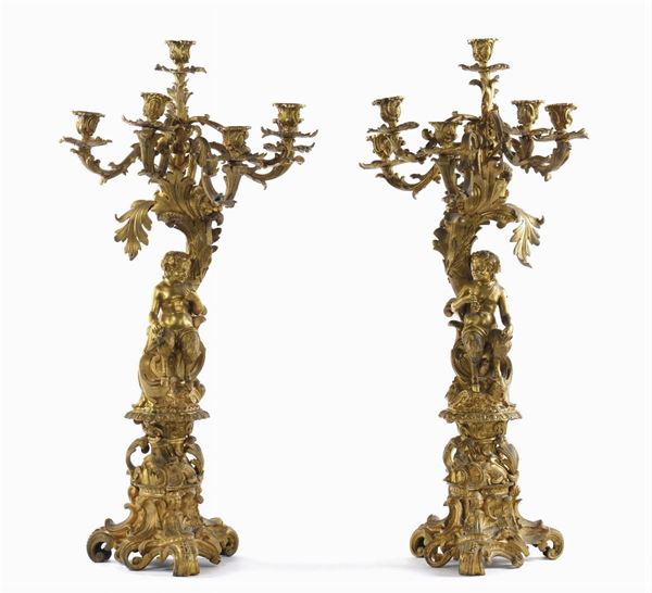 Coppia di candelieri in bronzo dorato, Francia XIX secolo
