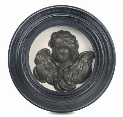 Altorilievo in Cera Monocroma Marrone Raffigurante Cherubino Entro Cornice in Legno Ebanizzato, I...