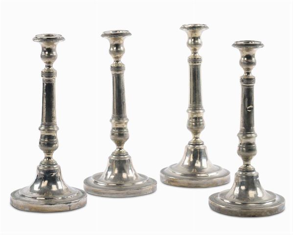 Quattro candelieri in argento, XIX secolo