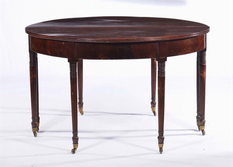 Tavolo circolare allungabile in mogano, XIX secolo  - Asta Antiquariato e Dipinti Antichi - Cambi Casa d'Aste