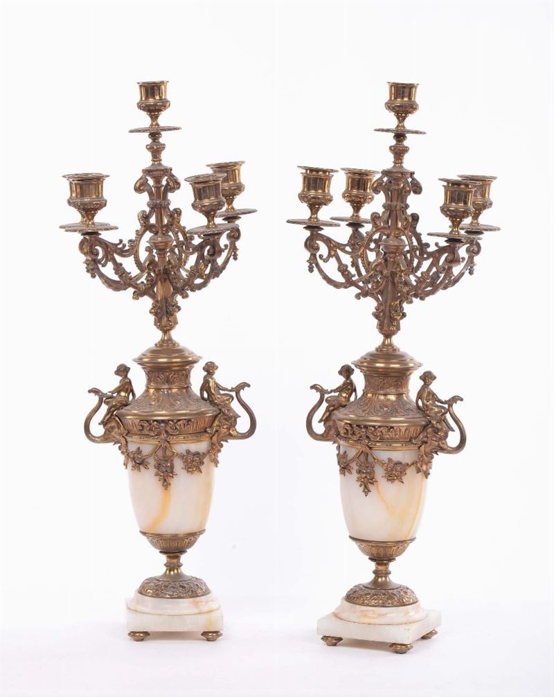 Coppia di candelieri a cinque luci in bronzo dorato  - Asta Antiquariato e Dipinti Antichi - Cambi Casa d'Aste