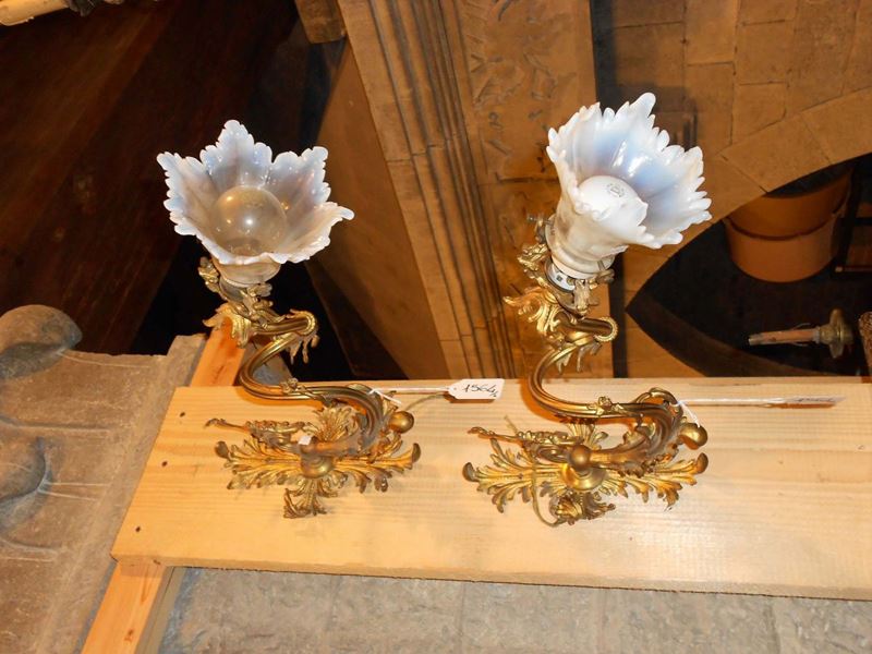 Coppia di appliques in metallo dorato  - Auction Antiques and Old Masters - Cambi Casa d'Aste