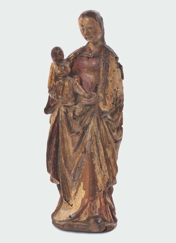 A polychrome and gilt wood sculpture representing a Madonna with Child, French art of the 16th century